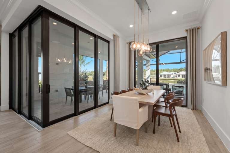 Brixton dining room with corner glass walls and natural light